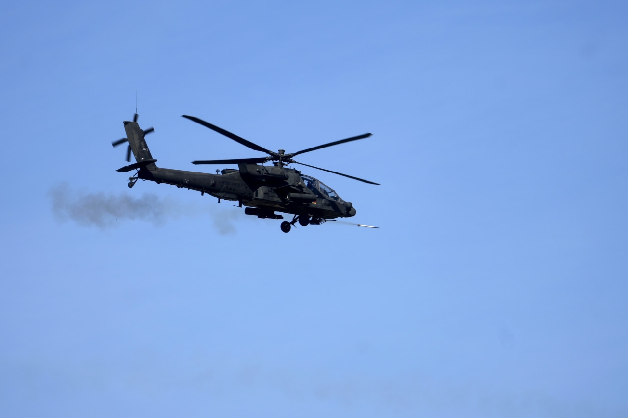 Trump Says U.S. Must Respond After Confirming Iran Shot Down Apache Helicopter The two crew members scrambled aboard the unmanned drone boat after two hours in the water.