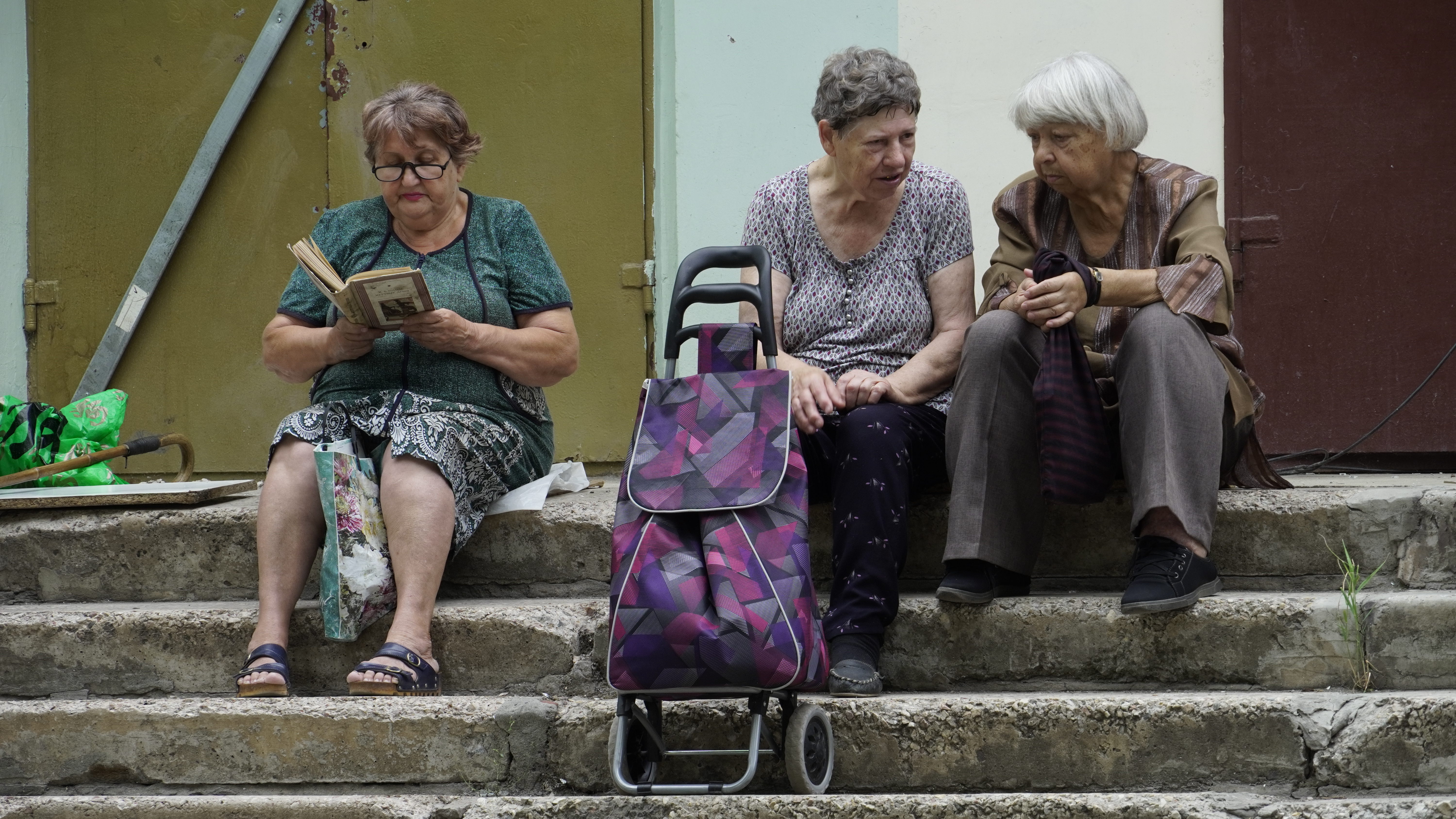 Russia Targets Pensioners Bank Deposits as Subsidy Rules Tighten in Temporarily Occupied Ukraine Russian occupation authorities will begin counting pensioners bank deposit interest when assessing eligibility for social benefits in occupied Ukrainian territories starting in June 2026, Ukrinform reported on May 18.The measure will factor in deposit interest when assessing pensioners financial need, affecting access to regional supplements, utility subsidies, and other social support.Interest income above the threshold of about $1,800 will be subject to a 13 personal income tax. Pensioners with modest base payments could lose subsidies if deposit interest is counted as additional income.The outlet described the measure as part of a wider pattern of administrative and financial pressure in Russian-occupied parts of Ukraine.Elderly residents are first pushed into Russian banking, pension, and registration systems, then those same systems are used to monitor income, restrict benefits, and impose new financial obligations.The policy could leave pensioners more dependent on occupation authorities for basic payments while giving those authorities greater control over access to social support.Read moreLatest newsNew Russian Auctions Nets $28 Million From Seized Ukrainian Assets in Occupied Areas
Jul 21, 2025 14:16
The Mariupol move reflects a broader expropriation mechanism now codified in Russian law. Authorities approved legislation on December 10 that allows occupation administrations to classify homes in occupied Ukrainian territories as unclaimed and transfer them to new users. The measure applies across Russian-occupied parts of Ukraine and places property owners at risk if they cannot confirm ownership under occupation rules.The Center for Countering Disinformation reported that the expropriation process is set to continue until 2030, extending the threat to displaced residents and those who remain under occupation.
Related articles
Russia Seizes Ukrainian Homes to House Migrants From Cuba and India in Temporarily Occupied Regions
Latest news
Jan 27, 2026 10:34
Russia-Installed Crimea Authorities Move to Seize Assets of Ukrainian Boxer Oleksandr Usyk
Latest news
Dec 16, 2025 17:59
BBC Investigation: Russia Confiscates Thousands of Homes of War-Displaced Ukrainians
Latest news
Apr 18, 2025 23:40